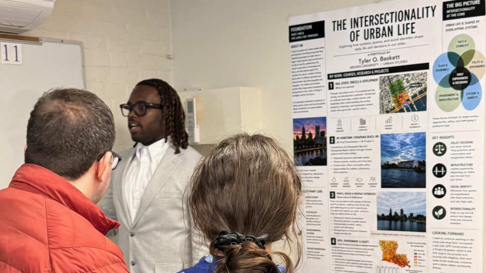 Tyler O. Baskett and poster