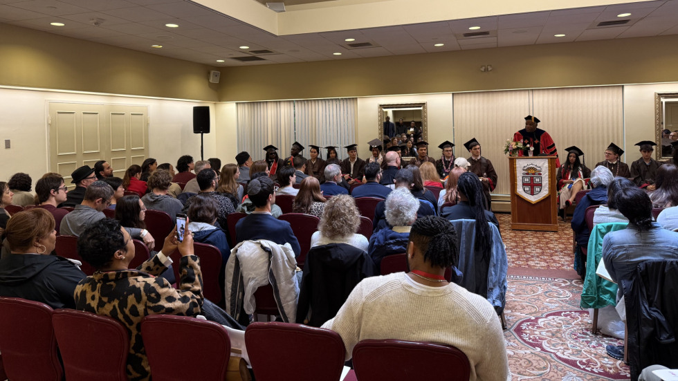 Room full of people for commencement ceremony